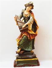 Heilige Cäcilia von Rom, eine Orgel spielend.