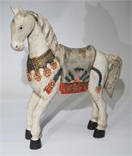 Spielzeug-Pferdefigur im antiken Stil.