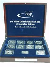 Silber-Gedenkmünzen  zu den Olympischen Spielen. 