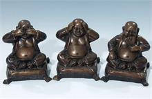 Drei Buddhas.